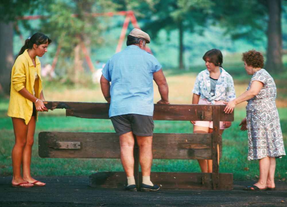 Ed Hausner, Family Salvages Picnic Table, Unidentified Park, 1978, NYC Parks Photo Archive